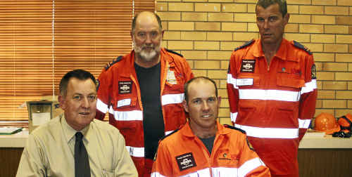 (Back) John Newley, David Bennett, Department of Community Services Director-General Jim McGowan and Jamie Goodwin. (Back) John Newley, David Bennett, Department of Community Services Director-General Jim McGowan and Jamie Goodwin.